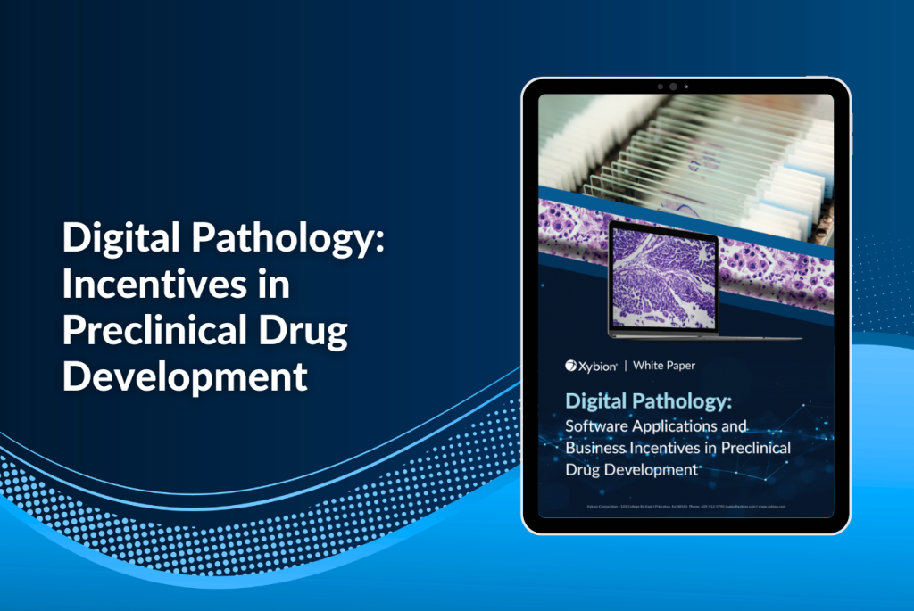 Promotional image for Xybion featuring the topic 'Digital Pathology: Incentives in Preclinical Drug Development,' with a tablet displaying a white paper on software applications and business incentives in preclinical drug development, set against a blue gradient background.