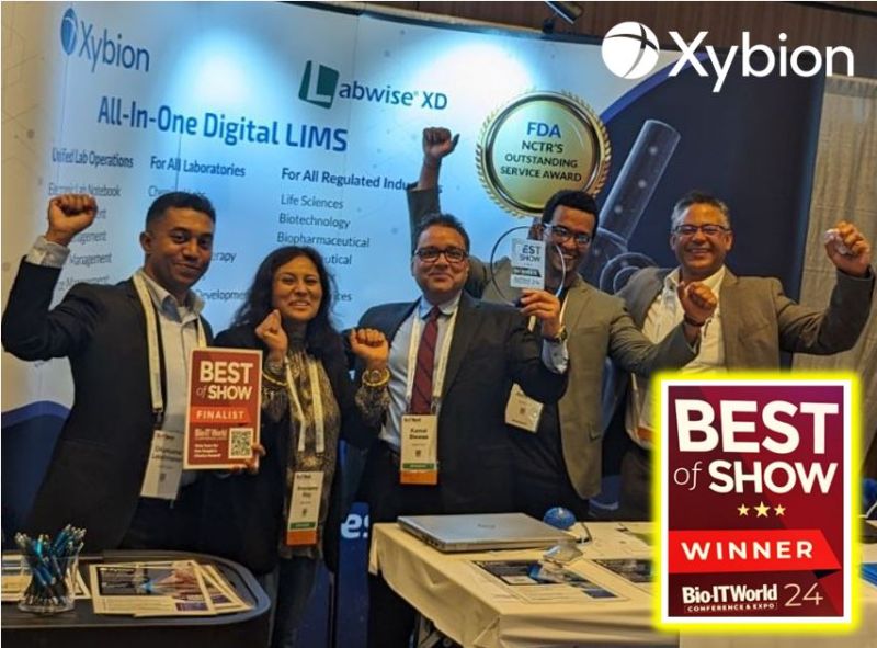 Xybion receiving an award for predictive compliance software
